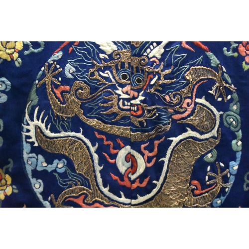 1091 - A 19TH CENTURY CHINESE SILK EMBROIDERED BLUE DRAGON ROBE Qing. 148 cm x 170 cm.