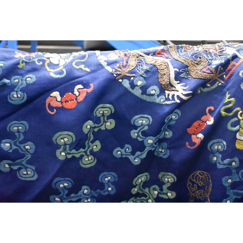 1091 - A 19TH CENTURY CHINESE SILK EMBROIDERED BLUE DRAGON ROBE Qing. 148 cm x 170 cm.