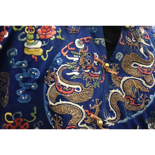 1091 - A 19TH CENTURY CHINESE SILK EMBROIDERED BLUE DRAGON ROBE Qing. 148 cm x 170 cm.