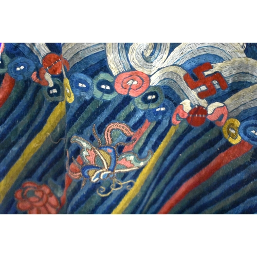 1091 - A 19TH CENTURY CHINESE SILK EMBROIDERED BLUE DRAGON ROBE Qing. 148 cm x 170 cm.