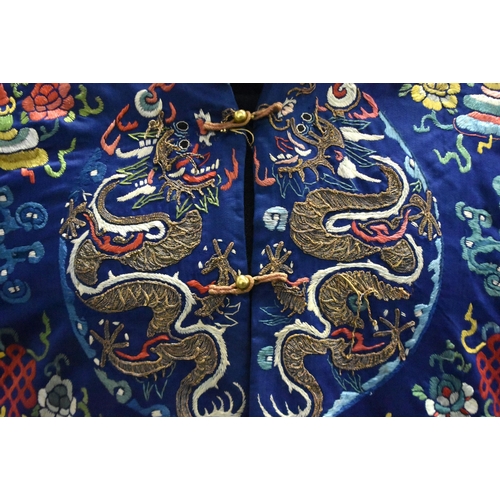 1091 - A 19TH CENTURY CHINESE SILK EMBROIDERED BLUE DRAGON ROBE Qing. 148 cm x 170 cm.