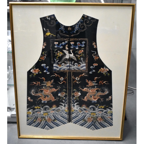 1096 - A LARGE 19TH CENTURY CHINESE FRAMED MIDNIGHT BLUE SILK DRAGON ROBE Qing. 106 cm x 86 cm.