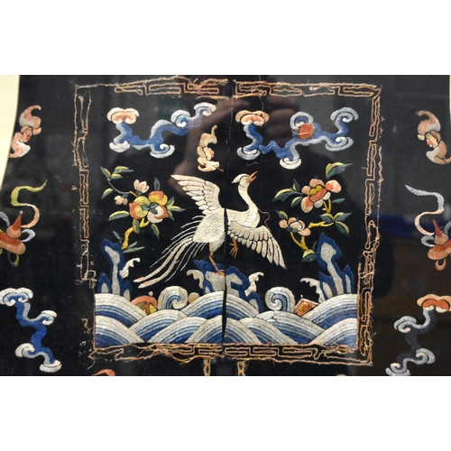 1096 - A LARGE 19TH CENTURY CHINESE FRAMED MIDNIGHT BLUE SILK DRAGON ROBE Qing. 106 cm x 86 cm.