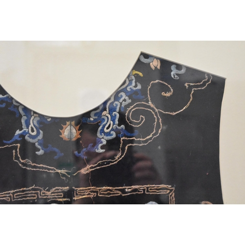 1096 - A LARGE 19TH CENTURY CHINESE FRAMED MIDNIGHT BLUE SILK DRAGON ROBE Qing. 106 cm x 86 cm.