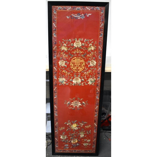 1102 - A LARGE 19TH CENTURY CHINESE RED SILK EMBROIDERED CHAIR COVER Qing. 172 cm x 52 cm.