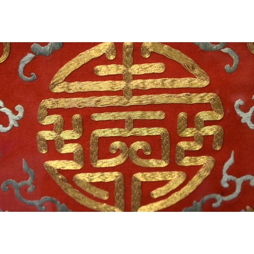 1102 - A LARGE 19TH CENTURY CHINESE RED SILK EMBROIDERED CHAIR COVER Qing. 172 cm x 52 cm.