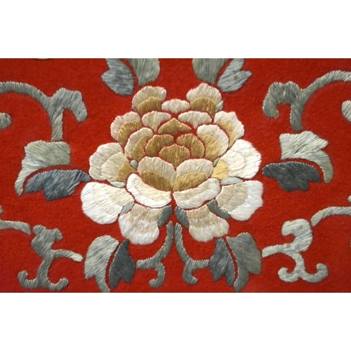 1102 - A LARGE 19TH CENTURY CHINESE RED SILK EMBROIDERED CHAIR COVER Qing. 172 cm x 52 cm.