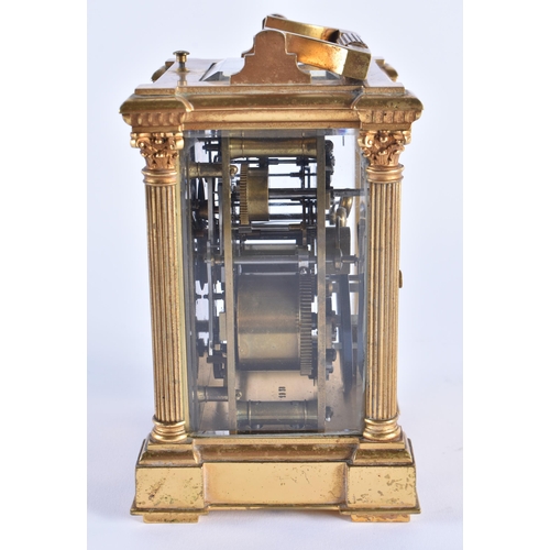 1105 - AN ANTIQUE FRENCH ENAMELLED REPEATING BRASS CARRIAGE CLOCK. 18 cm high inc handle.