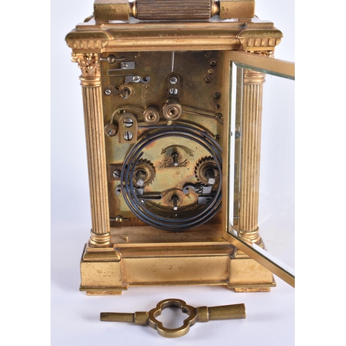 1105 - AN ANTIQUE FRENCH ENAMELLED REPEATING BRASS CARRIAGE CLOCK. 18 cm high inc handle.