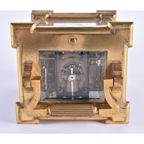 1105 - AN ANTIQUE FRENCH ENAMELLED REPEATING BRASS CARRIAGE CLOCK. 18 cm high inc handle.