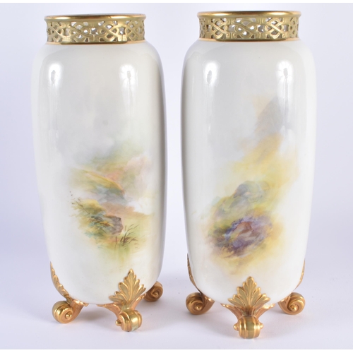 1106 - A PAIR OF ROYAL WORCESTER HARRY DAVIS PORCELAIN VASES painted with highland sheep. 22.5 cm high.