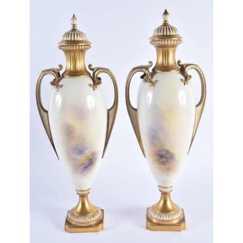 1109 - A FINE PAIR OF ROYAL WORCESTER HARRY STINTON PORCELAIN VASE by Harry Stinton. 36 cm high.