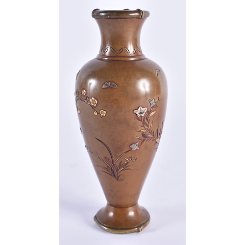 1137 - A 19TH CENTURY JAPANESE MEIJI PERIOD BRONZE SILVER ONLAID VASE decorated with flowers. 15.5 cm high.