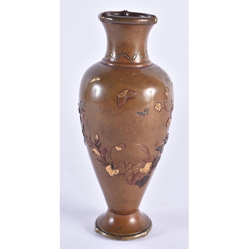 1137 - A 19TH CENTURY JAPANESE MEIJI PERIOD BRONZE SILVER ONLAID VASE decorated with flowers. 15.5 cm high.