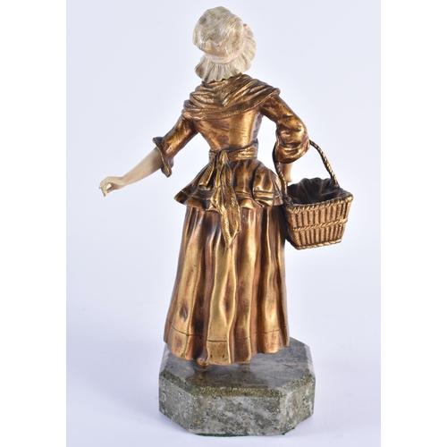 1138 - French School (C1910) Bronze, Female with basket. 25 cm high.