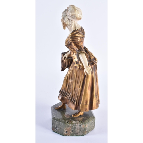 1138 - French School (C1910) Bronze, Female with basket. 25 cm high.