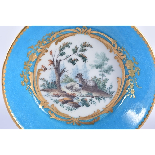 1141 - Sevres fine coffee can and saucer painted with farm animals in landscape enclosed in a gilt panel on... 