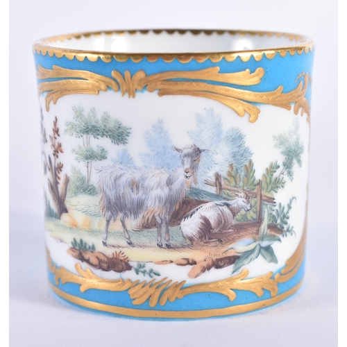 1141 - Sevres fine coffee can and saucer painted with farm animals in landscape enclosed in a gilt panel on... 