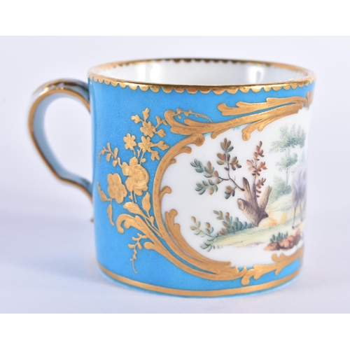 1141 - Sevres fine coffee can and saucer painted with farm animals in landscape enclosed in a gilt panel on... 