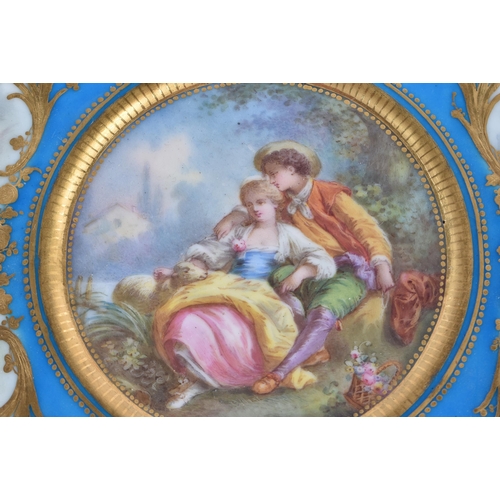 1147 - Sevres dish each of lobed form with bleu celeste grounds painted centrally with classical lovers aft... 