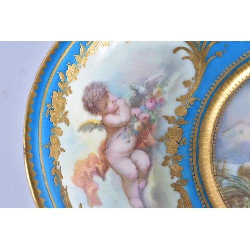 1147 - Sevres dish each of lobed form with bleu celeste grounds painted centrally with classical lovers aft... 