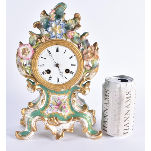 1154 - A 19TH CENTURY FRENCH PARIS PORCELAIN MANTEL CLOCK painted with flowers on a green ground. 27 cm x 1... 