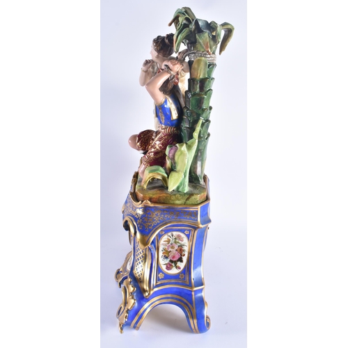 1155 - A FINE LARGE 19TH CENTURY FRENCH PARIS PORCELAIN MANTEL CLOCK formed with a slave figure beside anot... 