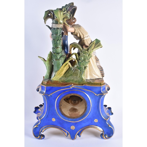 1155 - A FINE LARGE 19TH CENTURY FRENCH PARIS PORCELAIN MANTEL CLOCK formed with a slave figure beside anot... 