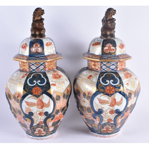 1158 - A LARGE PAIR OF 19TH CENTURY FRENCH SAMSONS OF PARIS IMARI PORCELAIN VASES AND COVERS after the C170... 