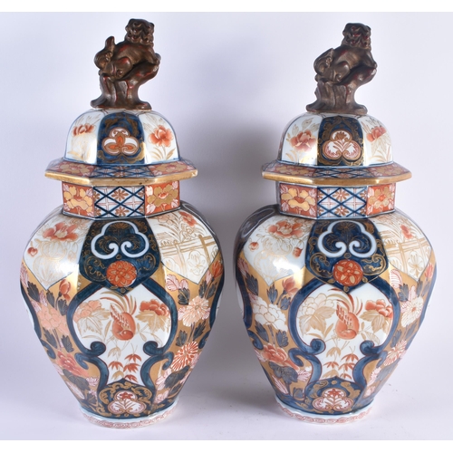 1158 - A LARGE PAIR OF 19TH CENTURY FRENCH SAMSONS OF PARIS IMARI PORCELAIN VASES AND COVERS after the C170... 