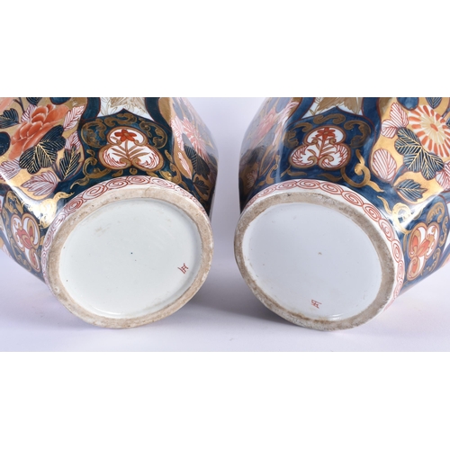 1158 - A LARGE PAIR OF 19TH CENTURY FRENCH SAMSONS OF PARIS IMARI PORCELAIN VASES AND COVERS after the C170... 