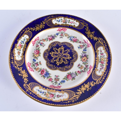 1168 - Late 18th century Sevres plate, the border painted in cobalt blue with four oval panels of flowers, ... 