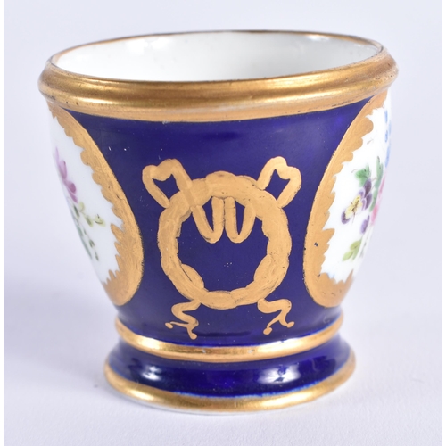 1169 - Sevres rare egg cup with cobalt blue ground painted with flowers in gilt panels Y mark for Bouilliat... 