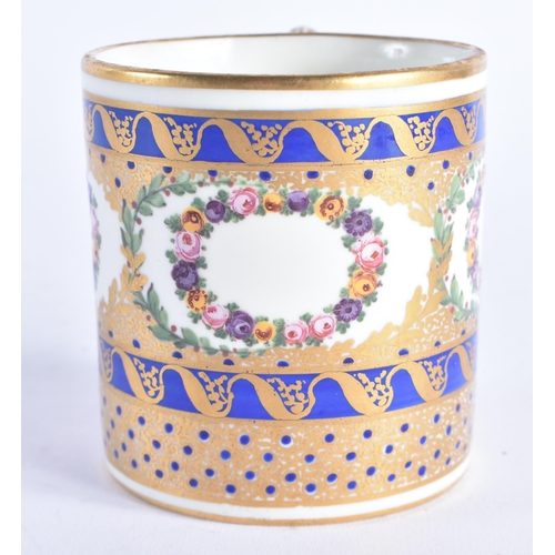 1206 - Late 18th century Sevres large coffee can painted with wreaths of flowers and ornately gilded on a c... 