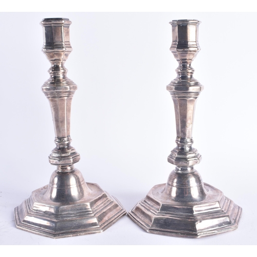 1217 - A PAIR OF 18TH CENTURY DUTCH SILVER CANDLESTICKS. 520 grams.22 cm high.