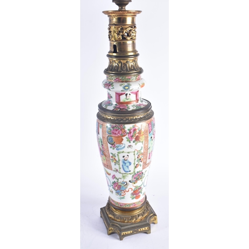 1218 - A LARGE 19TH CENTURY CHINESE CANTON FAMILLE ROSE OIL LAMP Qing. 51 cm high.