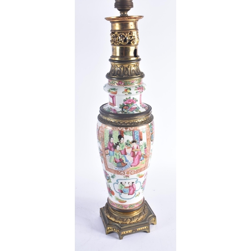 1218 - A LARGE 19TH CENTURY CHINESE CANTON FAMILLE ROSE OIL LAMP Qing. 51 cm high.