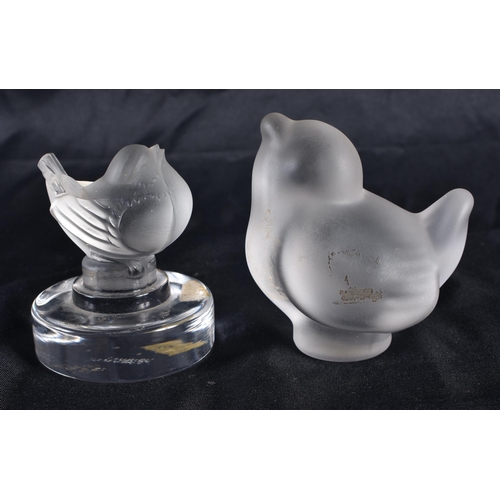 1227 - A FRENCH LALIQUE GLASS BIRD together with another glass bird. 6.5 cm high. (2)