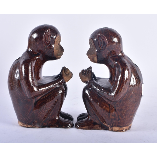 1243 - A PAIR OF 19TH CENTURY CHINESE BROWN GLAZED STONEWARE MONKEY INCENSE BURNERS. 17 cm high.