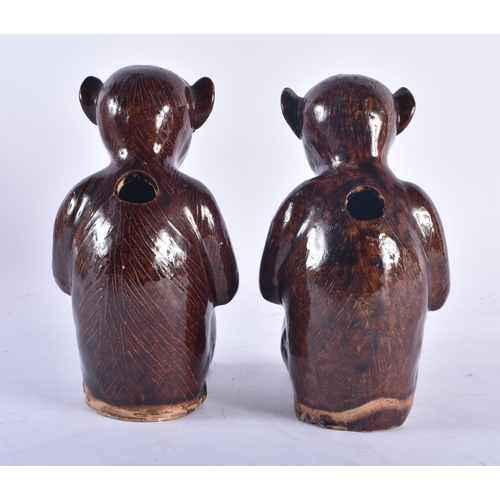 1243 - A PAIR OF 19TH CENTURY CHINESE BROWN GLAZED STONEWARE MONKEY INCENSE BURNERS. 17 cm high.