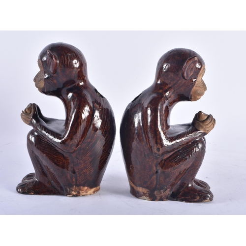 1243 - A PAIR OF 19TH CENTURY CHINESE BROWN GLAZED STONEWARE MONKEY INCENSE BURNERS. 17 cm high.