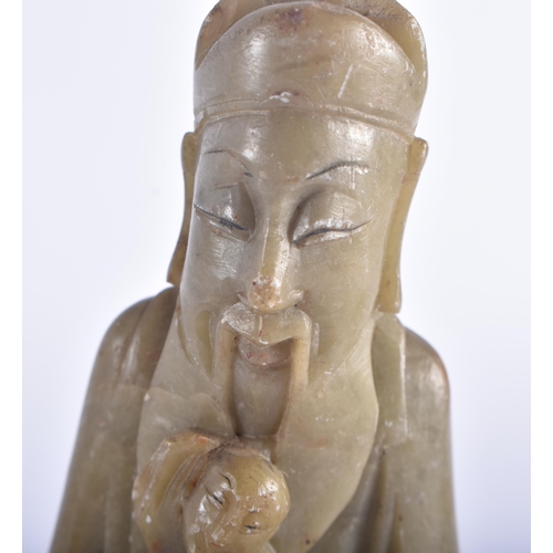 1248 - TWO 19TH CENTURY CHINESE CARVED SOAPSTONE FIGURES together with a jade chicken. Largest 13 cm high. ... 