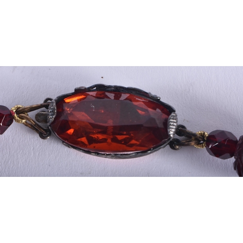 1251 - A CHERRY AMBER TYPE NECKLACE. 46 grams. 44 cm long.