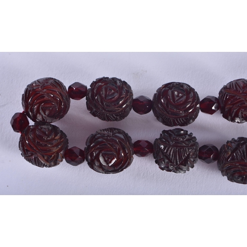 1251 - A CHERRY AMBER TYPE NECKLACE. 46 grams. 44 cm long.