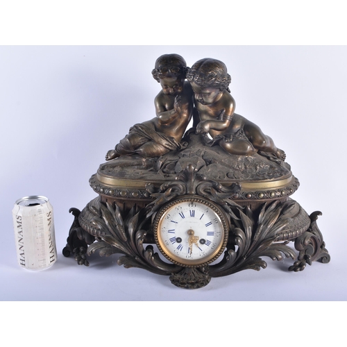 1255 - A LARGE 19TH CENTURY FRENCH BRONZE MANTEL CLOCK formed with two children. 38 cm x 42 cm.