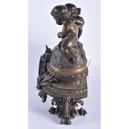 1255 - A LARGE 19TH CENTURY FRENCH BRONZE MANTEL CLOCK formed with two children. 38 cm x 42 cm.