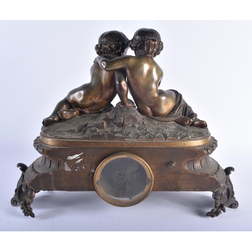 1255 - A LARGE 19TH CENTURY FRENCH BRONZE MANTEL CLOCK formed with two children. 38 cm x 42 cm.