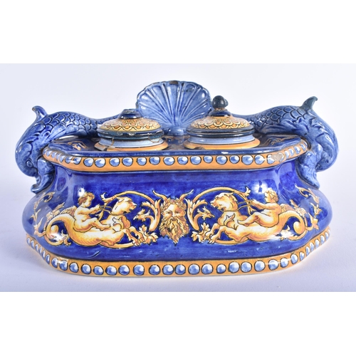 1269 - A 19TH CENTURY ITALIAN MAJOLICA COUNTRY HOUSE INKWELL AND COVER painted with figures riding mythical... 