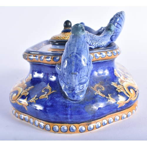 1269 - A 19TH CENTURY ITALIAN MAJOLICA COUNTRY HOUSE INKWELL AND COVER painted with figures riding mythical... 