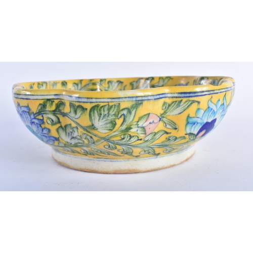 1270 - AN UNUSUAL 19TH CENTURY MIDDLE EASTERN IZNIK POTTERY BOWL painted with typical scrolling foliage upo... 